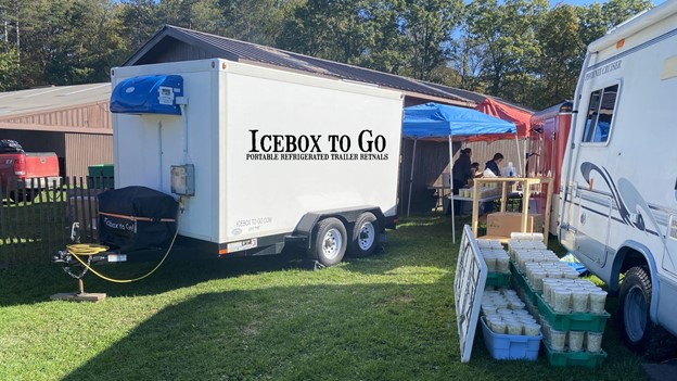Refrigerated trailer rentals for caterers outside.